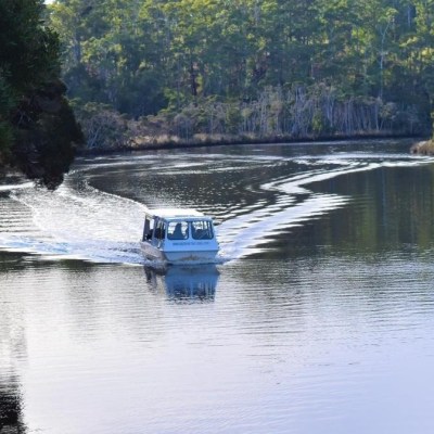 a small boat in a body of water